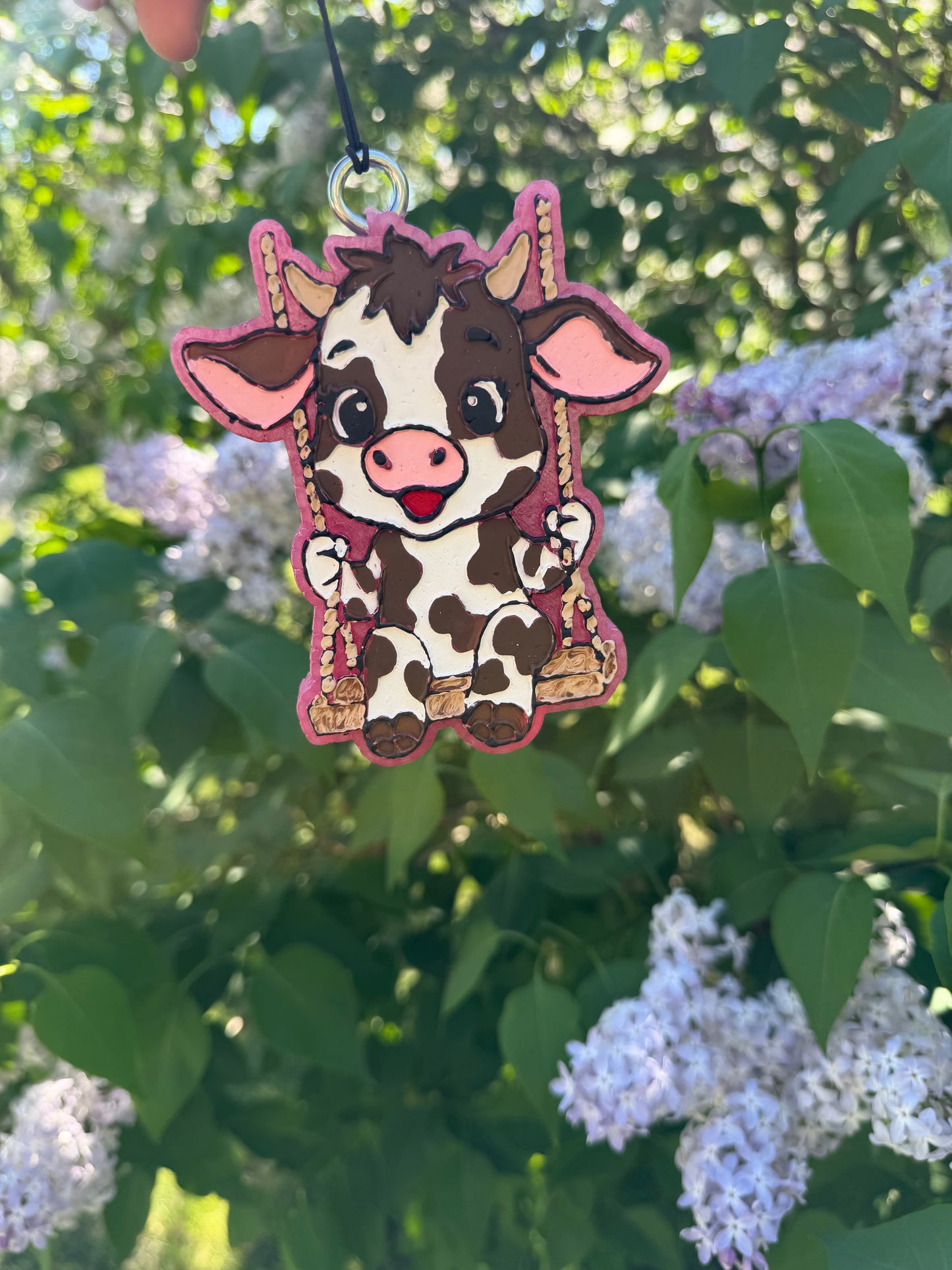 Cow on Swing